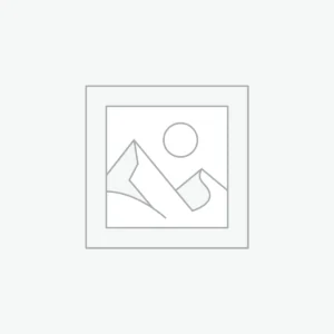 A person sitting on a bench outdoors in a casual outfit.